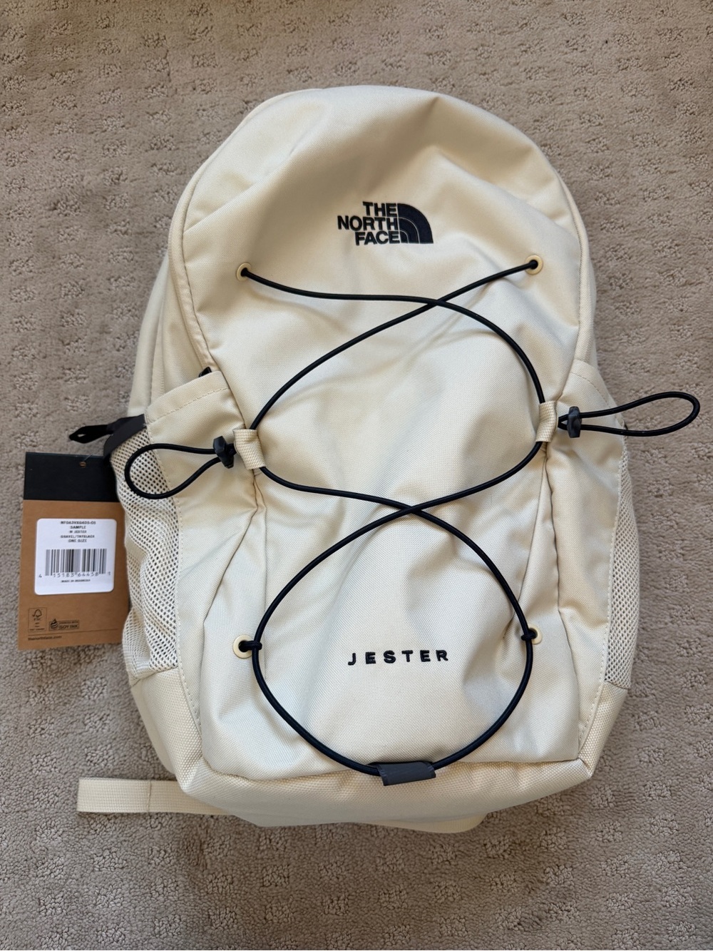The North Face Jester Backpack in Cream with Black Bungee